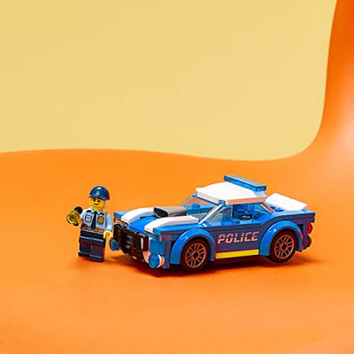 LEGO 60312 City Polizeiauto, Polizei-Spielzeug ab 5 Jahren, Geschenk für Kinder mit Polizisten-Minifigur, Abenteuer-Serie, kreatives Kinderspielzeug für Jungen und Mädchen