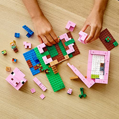 LEGO 21170 Minecraft Das Schweinehaus Bauset mit Figuren: Alex, Creeper und 2 Schweinefiguren, Tier-Spielzeug, Konstruktionsspielzeug, Geschenkidee für Jungen und Mädchen ab 8 Jahren